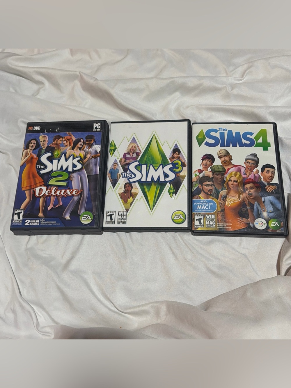 The Sims PC Game Collection - Sims 2 Deluxe, Sims 3, Sims 4 (EA) - White & Multi
